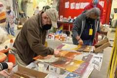 Alan Heim and Glenn Morgan decorate the speaker covers. --- Photo by Erik C. Andersen