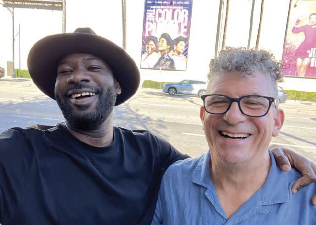 BUDDIES: Director Blitz Bazawule, left, with Jon Poll. PHOTO: Warner Bros.