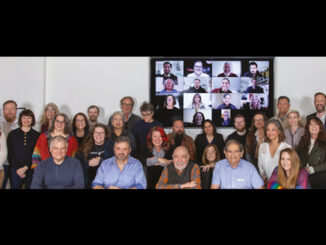 The members of the 2024 Editors Guild board (including Zoom attendees on-screen) pose on Jan. 6 with President Alan Heim, center.